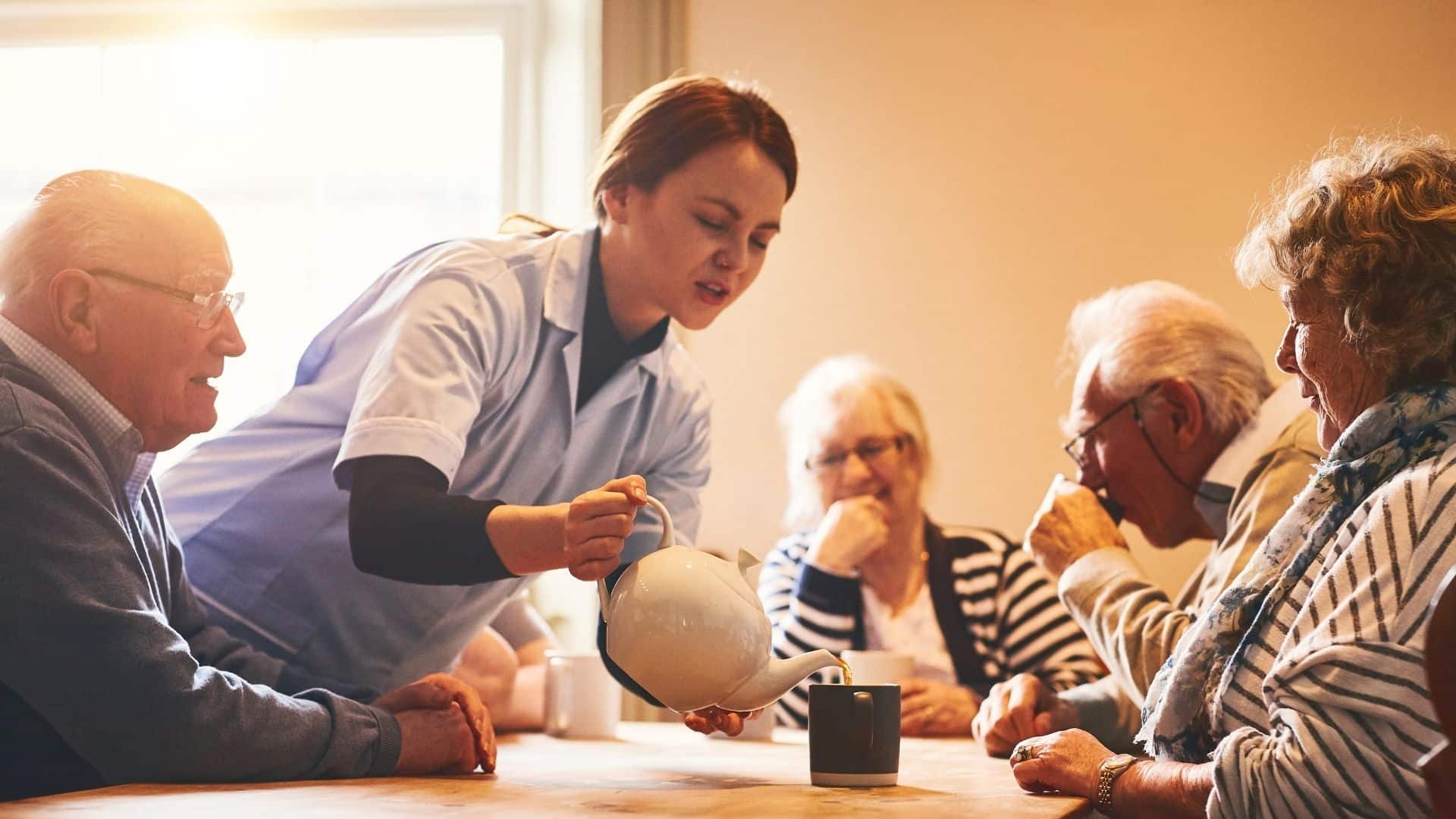 carer pouring tea