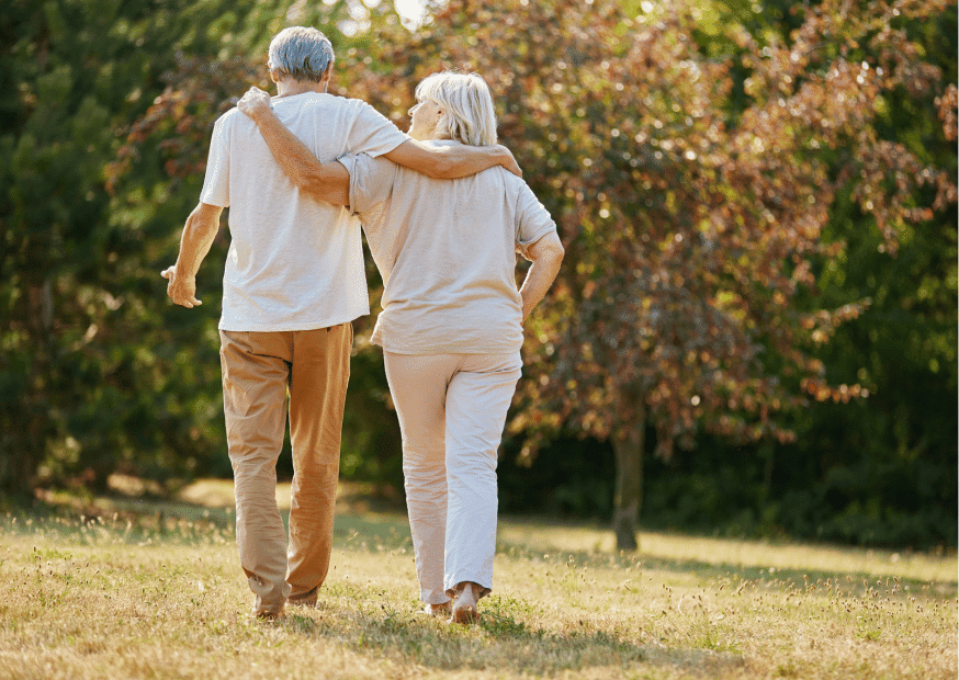 elderly couple walking