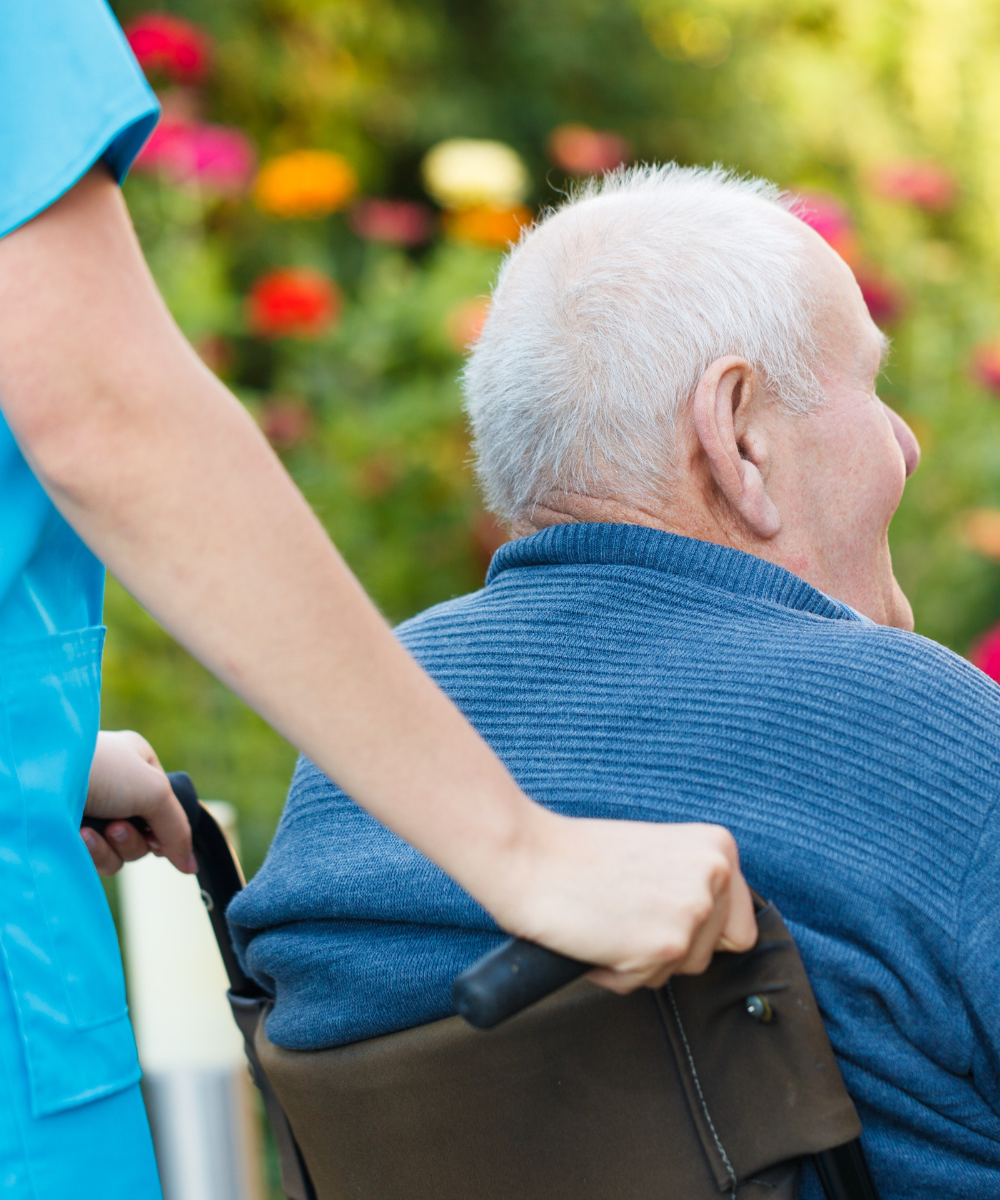 Portrait of senior man eating a healthy salad for lunch